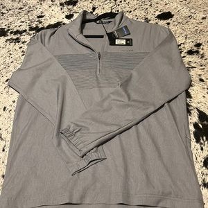 Travis Mathew low roller quarter zip.